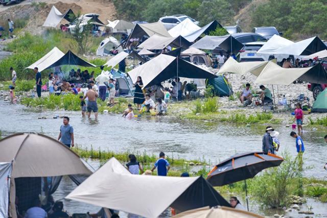 端午小长假“好玩不贵”:周边游出游人次占比近50%,主题乐园景区最受欢迎